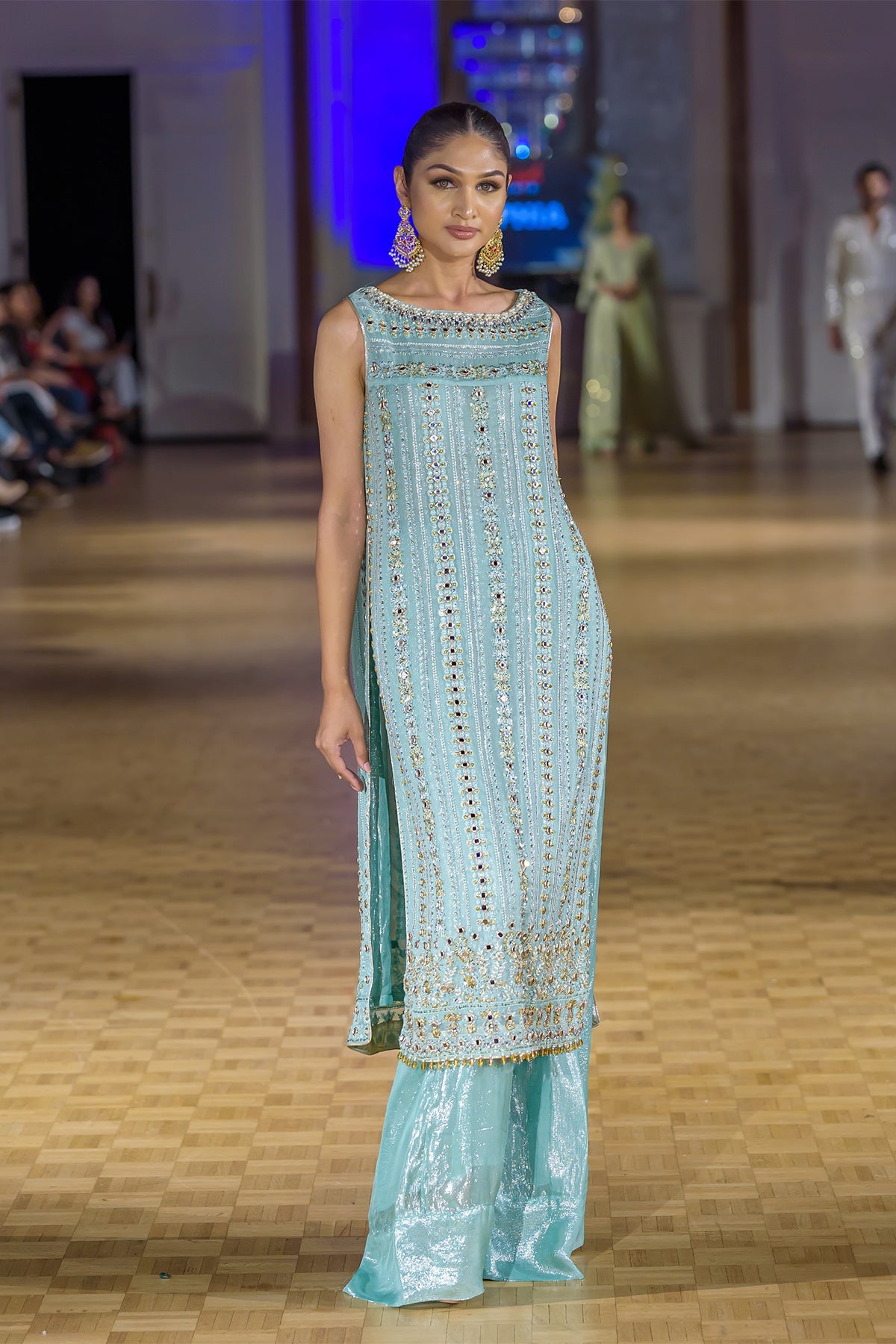 sequin dress pakistan The Eastern Pakistani silk dress is a captivating blend of traditional charm and modern elegance. The front of the dress is adorned with a shimmering all-over sequin spray, adding a touch of